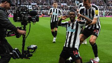NEWCASTLE UPON TYNE, ENGLAND - MARCH 12: Alexander Isak of Newcastle United (14) celebrates after scoring opening goal during the Premier League match between Newcastle United and Wolverhampton Wanderers at St. James Park on March 12, 2023 in Newcastle upon Tyne, England. (Photo by Serena Taylor/Newcastle United via Getty Images)