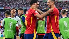 Spain's midfielder #06 Mikel Merino celebrates with teammates after scoring his team's second goal during the UEFA Euro 2024 quarter-final football match between Spain and Germany at the Stuttgart Arena in Stuttgart on July 5, 2024. (Photo by Tobias SCHWARZ / AFP)