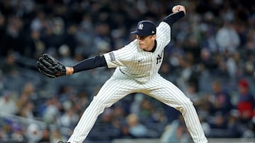 Oct 14, 2024; Bronx, New York, USA; New York Yankees pitcher Tim Hill (54) pitches during the eighth inning against the Cleveland Guardians in game one of the ALCS for the 2024 MLB Playoffs at Yankee Stadium. Mandatory Credit: Brad Penner-Imagn Images