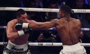 Joshua outpoints Parker to close in on undisputed heavyweight crown