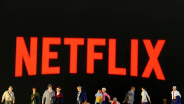 FILE PHOTO: Small toy figures are seen in front of diplayed Netflix logo in this illustration taken March 19, 2020. REUTERS/Dado Ruvic/Illustration/File Photo