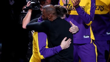DALLAS, TEXAS - APRIL 09: (L-R) Luka Doncic #77 hugs LeBron James #23 of the Los Angeles Lakers before the game against the Dallas Mavericks at American Airlines Center on April 09, 2025 in Dallas, Texas. NOTE TO USER: User expressly acknowledges and agrees that, by downloading and or using this photograph, user is consenting to the terms and conditions of the Getty Images License Agreement. Sam Hodde/Getty Images/AFP (Photo by Sam Hodde / GETTY IMAGES NORTH AMERICA / Getty Images via AFP)