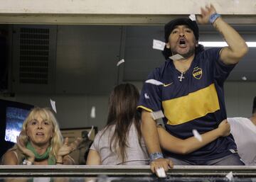 Diego Armando Maradona supporting Boca Juniors at La Bombonera.