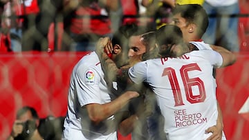 Sevilla&#039;s midfielder Pablo Sarabia (C) celebrates a goal with teammates during the Spanish league football match Sevilla FC vs RC Deportivo de la Coruna at the Ramon Sanchez Pizjuan stadium in Sevilla on April 8, 2017. / AFP PHOTO / CRISTINA QUICLER