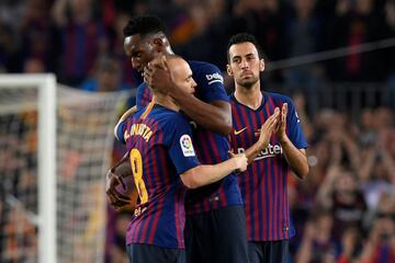 Andres Iniesta walks off the pitch. Iniesta, who joined Barcelona's academy 22 years ago, played his final game for the club.