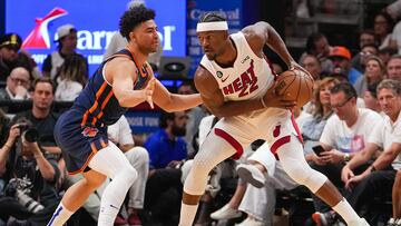 MIAMI, FLORIDA - MAY 06: Quentin Grimes #6 of the New York Knicks defends Jimmy Butler #22 of the Miami Heat during game three of the Eastern Conference Semifinals at Kaseya Center on May 06, 2023 in Miami, Florida. NOTE TO USER: User expressly acknowledges and agrees that,� by downloading and or using this photograph,� User is consenting to the terms and conditions of the Getty Images License Agreement. Eric Espada/Getty Images/AFP (Photo by Eric Espada / GETTY IMAGES NORTH AMERICA / Getty Images via AFP)