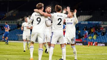 LEEDS, ENGLAND - FEBRUARY 08: Patrick Bamford of Leeds United celebrates with (L-R) Stuart Dallas, Luke Ayling, Raphinha after scoring their team's second goal during the Premier League match between Leeds United and Crystal Palace at Elland Road on