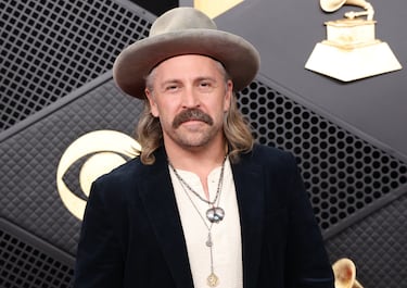 Hank Bentley posa en la alfombra roja.