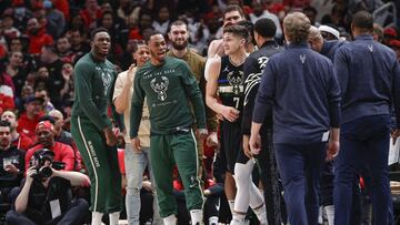 Apr 22, 2022; Chicago, Illinois, USA; Milwaukee Bucks guard Grayson Allen (7) celebrates with teammates after scoring against the Chicago Bulls during the second half of game three of the first round for the 2022 NBA playoffs at United Center. Mandatory Credit: Kamil Krzaczynski-USA TODAY Sports