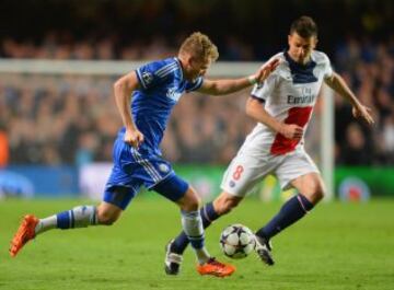 Andre Schurrle y Thiago Motta.