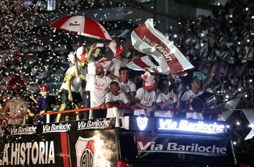 River Plate's players celebrate with the 2018 Libertadores Cup trophy at the Monumental stadium in Buenos Aires on December 23, 2018, after beating arch rival Boca Juniors by 3-1 in Madrid on December 9, 2018, in a controversial second leg that was postpo