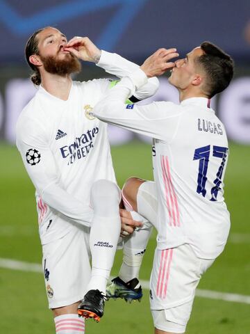 MADRID, SPAIN - MARCH 16: Sergio Ramos of Real Madrid Celebrates 2-0 with Lucas Vazquez of Real Madrid during the UEFA Champions League match between Real Madrid v Atalanta Bergamo at the Estadio Alfredo Di Stefano on March 16, 2021 in Madrid Spain (Photo