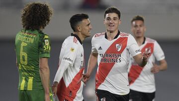 River Plate&#039;s forward Julian Alvarez (R) celebrates next to teammate forward Matias Suarez (C) after scoring a goal against Aldosivi during their Argentine first division Superliga football match at the Monumental stadium in Buenos Aires, on August 2