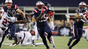 Sep 22, 2016; Foxborough, MA, USA; New England Patriots running back LeGarrette Blount (29) runs through the Houston Texans defense for a touchdown during the second half at Gillette Stadium. Mandatory Credit: Winslow Townson-USA TODAY Sports