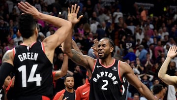 Dec 26, 2018; Miami, FL, USA; Toronto Raptors forward Kawhi Leonard (right) celebrates with guard Danny Green (left after defeating the Miami Heat at American Airlines Arena. Mandatory Credit: Steve Mitchell-USA TODAY Sports