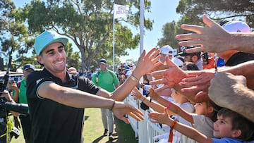 Chile's Joaquin Niemann celebrates with spectators after his victory during the final day of the LIV Golf Adelaide at the Grange Golf Club in Adelaide