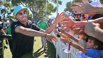 Chile's Joaquin Niemann celebrates with spectators after his victory during the final day of the LIV Golf Adelaide at the Grange Golf Club in Adelaide on February 16, 2025. (Photo by Brenton Edwards / AFP) / -- IMAGE RESTRICTED TO EDITORIAL USE - STRICTLY NO COMMERCIAL USE --