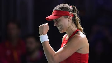Spain's Paula Badosa reacts after winning the second set against Poland's Iga Swiatek during their singles tennis match between Spain and Poland at the Billie Jean King Cup Finals at the Palacio de Deportes Jose Maria Martin Carpena in Malaga, Spain, on November 15, 2024. (Photo by JORGE GUERRERO / AFP)