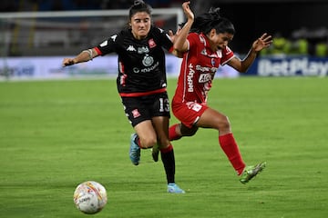 Independiente Santa Fe mantuvo la ventaja contra América de Cali en el estadio Pascual Guerrero y se coronó campeón por tercera vez en la historia.