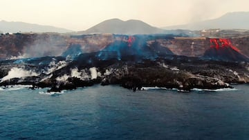 This image grab taken from a video provided by the Spanish Institute of Oceanography (IEO-CSIC) shows an aerial shot from the oceanographic vessel Ramon Margalef (IEO) of the delta formed on the coast from the lava of the Cumbre Vieja volcano, on the Cana