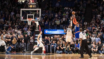 Nov 30, 2016; Minneapolis, MN, USA; New York Knicks forward Carmelo Anthony (7) shoots the game-winning basket over Minnesota Timberwolves forward Andrew Wiggins (22) during the fourth quarter at Target Center. The Knicks defeated the Timberwolves 106-104. Mandatory Credit: Brace Hemmelgarn-USA TODAY Sports