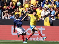 France's midfielder #13 N'Golo Kante and Colombia's forward #07 Luis Diaz fight for the ball during a friendly football match between Colombia and France at Northwest Stadium in Landover, Maryland, on March 29, 2026. (Photo by FRANCK FIFE / AFP)