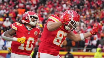 Jan 18, 2025; Kansas City, Missouri, USA; Kansas City Chiefs tight end Travis Kelce (87) celebrates with running back Isiah Pacheco (10) after making a long pass reception against the Houston Texans during the second quarter of a 2025 AFC divisional round game at GEHA Field at Arrowhead Stadium. Mandatory Credit: Denny Medley-Imagn Images