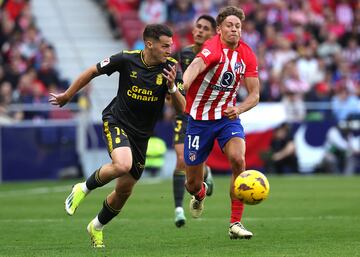 Carrera entre Marcos Llorente y Mika Marmol.