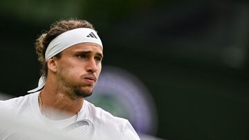 Germany's Alexander Zverev reacts as he plays against Britain's Cameron Norrie during their men's singles tennis match on the sixth day of the 2024 Wimbledon Championships at The All England Lawn Tennis and Croquet Club in Wimbledon, southwest London, on July 6, 2024. (Photo by ANDREJ ISAKOVIC / AFP) / RESTRICTED TO EDITORIAL USE