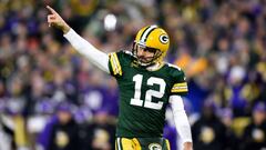 GREEN BAY, WISCONSIN - JANUARY 01: Aaron Rodgers #12 of the Green Bay Packers celebrates after touchdown during the fourth quarter against the Minnesota Vikings at Lambeau Field on January 01, 2023 in Green Bay, Wisconsin. (Photo by Kayla Wolf/Getty Images)
