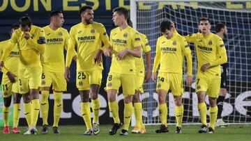 Villarreal's Gerard Moreno (R) celebrate after scoring the 2-0 goal with his teammate during Europa League match round of 16 Second leg between Villarreal CF and Dynamo Kyiv at La Ceramica stadium. In Villarreal on March 18, 2021.