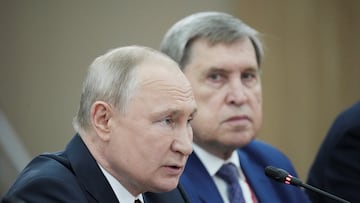 Russian President Vladimir Putin and Presidential Aide Yuri Ushakov attend a meeting with Mozambique President Filipe Jacinto Nyusi on the sidelines of Russia-Africa summit in Saint Petersburg, Russia, July 27, 2023. Sputnik/Alexei Danichev/Pool via REUTERS ATTENTION EDITORS - THIS IMAGE WAS PROVIDED BY A THIRD PARTY.