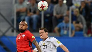 Chile&#039;s midfielder Arturo Vidal (L) vies for the ball against Germany&#039;s midfielder Sebastian Rudy during the 2017 Confederations Cup final football match between Chile and Germany at the Saint Petersburg Stadium in Saint Petersburg on July 2, 2017. / AFP PHOTO / FRANCK FIFE