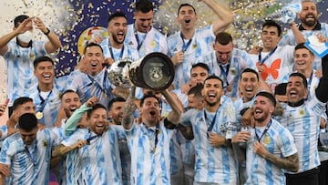 Argentina&#039;s Lionel Messi holds the trophy as he celebrates on the podium with teammates after winning the Conmebol 2021 Copa America football tournament final match against Brazil at Maracana Stadium in Rio de Janeiro, Brazil, on July 10, 2021. - Arg