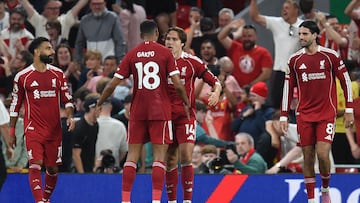 Soccer Football - Premier League - Liverpool v AFC Bournemouth - Anfield, Liverpool, Britain - August 15, 2025 Liverpool's Federico Chiesa celebrates scoring their third goal with Cody Gakpo REUTERS/Peter Powell EDITORIAL USE ONLY. NO USE WITH UNAUTHORIZED AUDIO, VIDEO, DATA, FIXTURE LISTS, CLUB/LEAGUE LOGOS OR 'LIVE' SERVICES. ONLINE IN-MATCH USE LIMITED TO 120 IMAGES, NO VIDEO EMULATION. NO USE IN BETTING, GAMES OR SINGLE CLUB/LEAGUE/PLAYER PUBLICATIONS. PLEASE CONTACT YOUR ACCOUNT REPRESENTATIVE FOR FURTHER DETAILS..