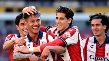 San Luis' defender #31 Eduardo Aguila (2nd-L) celebrates after scoring his team's second goal with teammates during the Liga MX Clausura football match between Atlas and San Luis at the Jalisco Stadium in Guadalajara, state of Jalisco, Mexico, on February 21, 2026. (Photo by Ulises Ruiz / AFP)