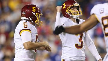 LANDOVER, MARYLAND - SEPTEMBER 16: Dustin Hopkins #3 of the Washington Football Team kicks a field goal to win the game 30-29 against the New York Giants at FedExField on September 16, 2021 in Landover, Maryland.   Patrick Smith/Getty Images/AFP
 == FOR N