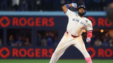 TORONTO, ONTARIO - NOVEMBER 02: Vladimir Guerrero Jr. #27 of the Toronto Blue Jays reacts after hitting a double during the eleventh inning against the Los Angeles Dodgers in game seven of the 2025 World Series at Rogers Center on November 02, 2025 in Toronto, Ontario. Gregory Shamus/Getty Images/AFP (Photo by Gregory Shamus / GETTY IMAGES NORTH AMERICA / Getty Images via AFP)