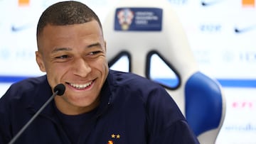 France's forward #10 Kylian Mbappe smiles as he holds a press conference at the Poljud Stadium in Split, on March 19, 2025, on the eve of the UEFA Nations League quarter-final first leg match between Croatia and France. (Photo by FRANCK FIFE / AFP)