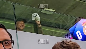 Mbappé sends fans into frenzy with mid-match shirt signing from the VIP box