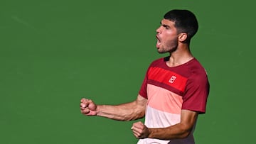 Mar 8, 2025; Indian Wells, CA, USA; Carlos Alcaraz (ESP) reacts after defeating Quentin Halys (FRA) at Indian Well Tennis Garden. Mandatory Credit: Jonathan Hui-Imagn Images