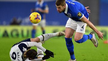 31 January 2021, United Kingdom, Brighton: Tottenham Hotspur's Gareth Bale and Brighton and Hove Albion's Adam Webster battle for the ball during the English Premier League soccer match between Brighton & Hove Albion and Tottenham Hotspur at