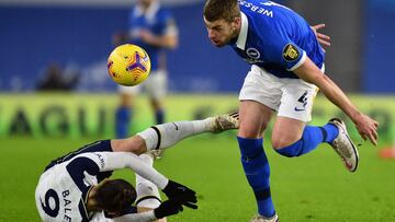 31 January 2021, United Kingdom, Brighton: Tottenham Hotspur&#039;s Gareth Bale and Brighton and Hove Albion&#039;s Adam Webster battle for the ball during the English Premier League soccer match between Brighton &amp; Hove Albion and Tottenham Hotspur at