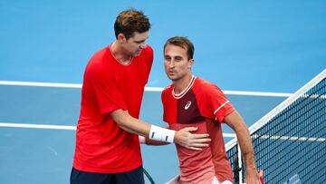 Chile's Nicolas Jarry (L) shakes hands with Canada's Steven Diez after victory during their men's singles match at the United Cup tennis tournament on Ken Rosewall Arena in Sydney on December 31, 2023. (Photo by DAVID GRAY / AFP) / -- IMAGE RESTRICTED TO EDITORIAL USE - STRICTLY NO COMMERCIAL USE --