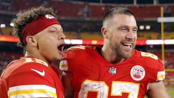 KANSAS CITY, MISSOURI - OCTOBER 10: Patrick Mahomes #15 and Travis Kelce #87 of the Kansas City Chiefs celebrate after the Chiefs defeated the Las Vegas Raiders 30-29 to win the game at Arrowhead Stadium on October 10, 2022 in Kansas City, Missouri.   David Eulitt/Getty Images/AFP