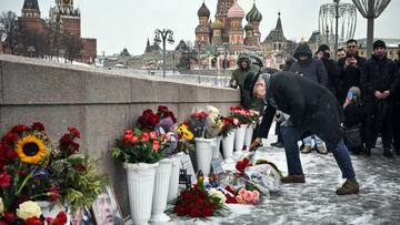 France's Ambassador to Russia Pierre Levy lays flowers at the site where late opposition leader Boris Nemtsov was fatally shot on a bridge near the Kremlin in central Moscow on February 27, 2023, on the eighth anniversary of his assassination. - Nemtsov was one of President Vladimir Putin's loudest critics until he was shot and killed on a Moscow bridge near the Kremlin on February 27, 2015. (Photo by Alexander NEMENOV / AFP) (Photo by ALEXANDER NEMENOV/AFP via Getty Images)