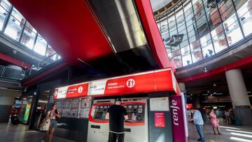 MADRID, SPAIN - AUGUST 26: A traveler takes a ticket from one of the ticket vending machines, at Atocha station, on August 26, 2022, in Madrid, Spain. The new free pass for Renfe users and high-speed multi-journey tickets with a 50% discount, approved as part of the anti-crisis decree to combat the consequences of the war in Ukraine and high energy prices, have been available for purchase since August 24. The passes, valid for travel between September 1 and December 31, 2022, can be obtained through the Renfe Cercanias mobile app, and at ticket offices and self-sale machines at stations. (Photo By Ricardo Rubio/Europa Press via Getty Images)