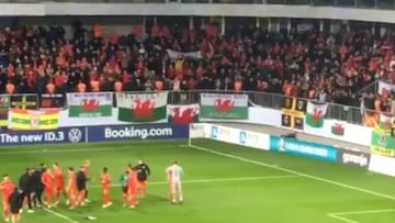 Wales fans celebrate win with "Wales, golf, Madrid" Bale chant