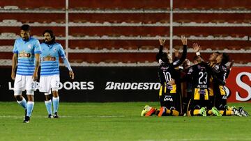 Football Soccer - Bolivia&#039;s The Strongest v Peru&#039;s Sporting Cristal - Copa Libertadores - Hernando Siles stadium, La Paz, Bolivia 4/5/17. Sporting Crista Josepmir Aaron Ballon (L)  and Jair Edson Cespedes react as The Strongest players celebrates a goal. REUTERS/David Mercado