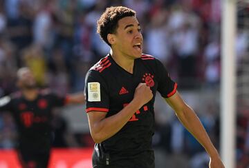 Bayern Munich's German midfielder Jamal Musiala celebrates scoring during the German first division Bundesliga football match between FC Cologne and FC Bayern Munich in Cologne, western Germany on May 27, 2023. (Photo by CHRISTOF STACHE / AFP) / DFL REGULATIONS PROHIBIT ANY USE OF PHOTOGRAPHS AS IMAGE SEQUENCES AND/OR QUASI-VIDEO